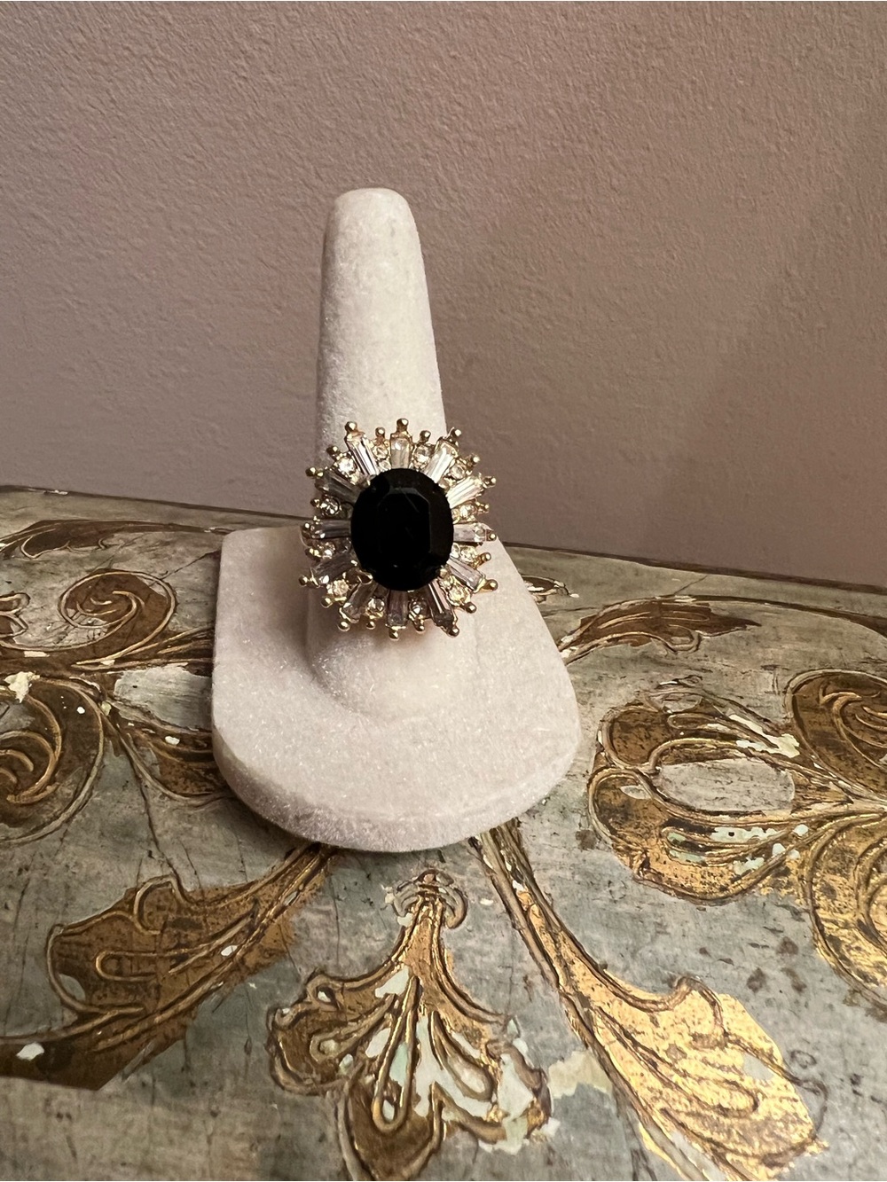Gold Cocktail Ring with Black Center Stone and Sparkling Baguettes